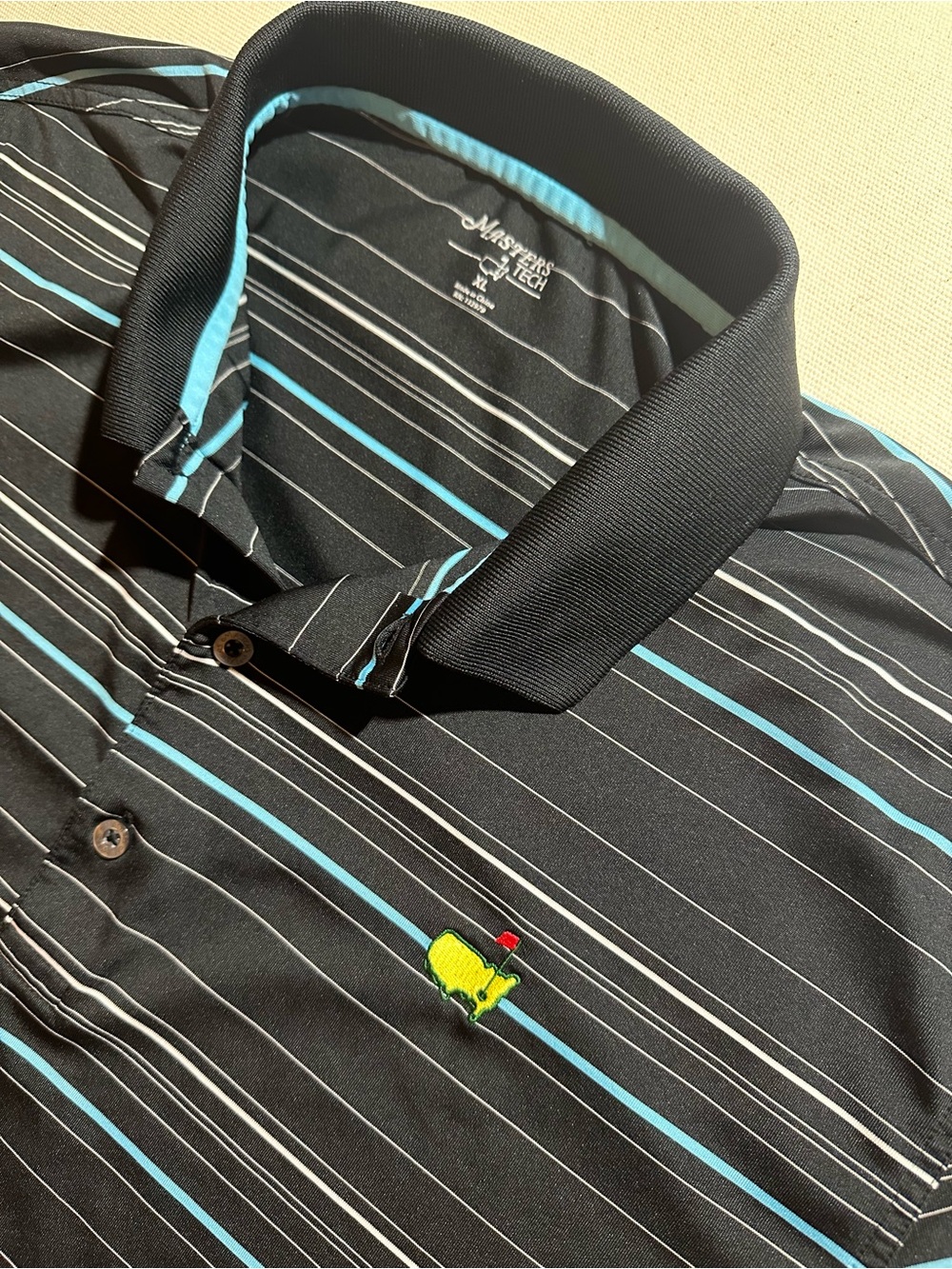 Masters Golf Tournament Black Polo with Blue and White Stripes